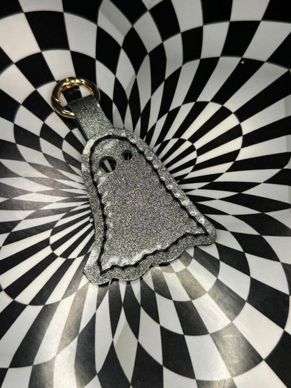 Ghost keychains! Glow in the dark spooky boys!