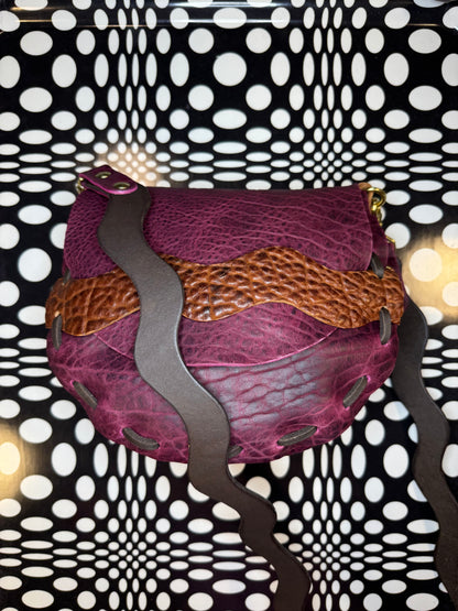 curved leather saddle bag handmade