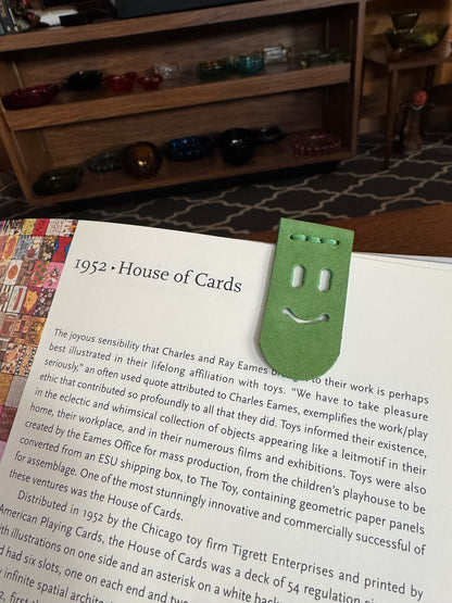 Handmade green leather book creeper, bookmark with face 