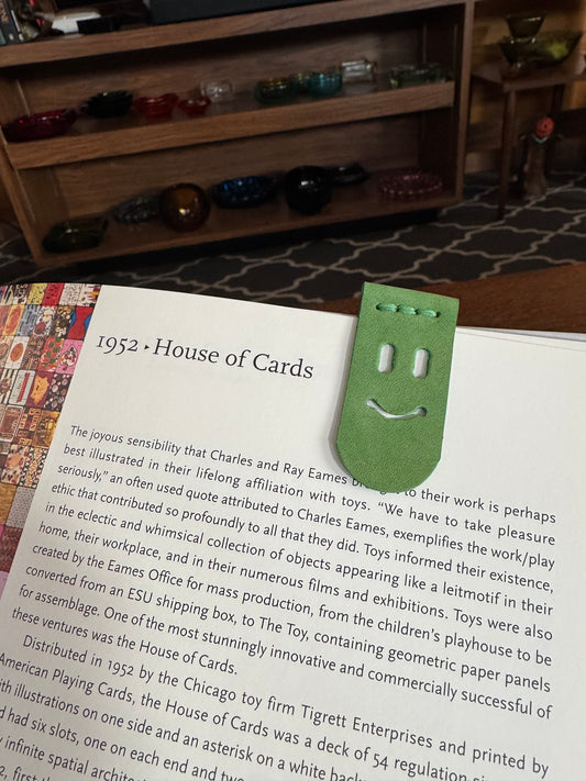 Handmade green leather book creeper, bookmark with face 