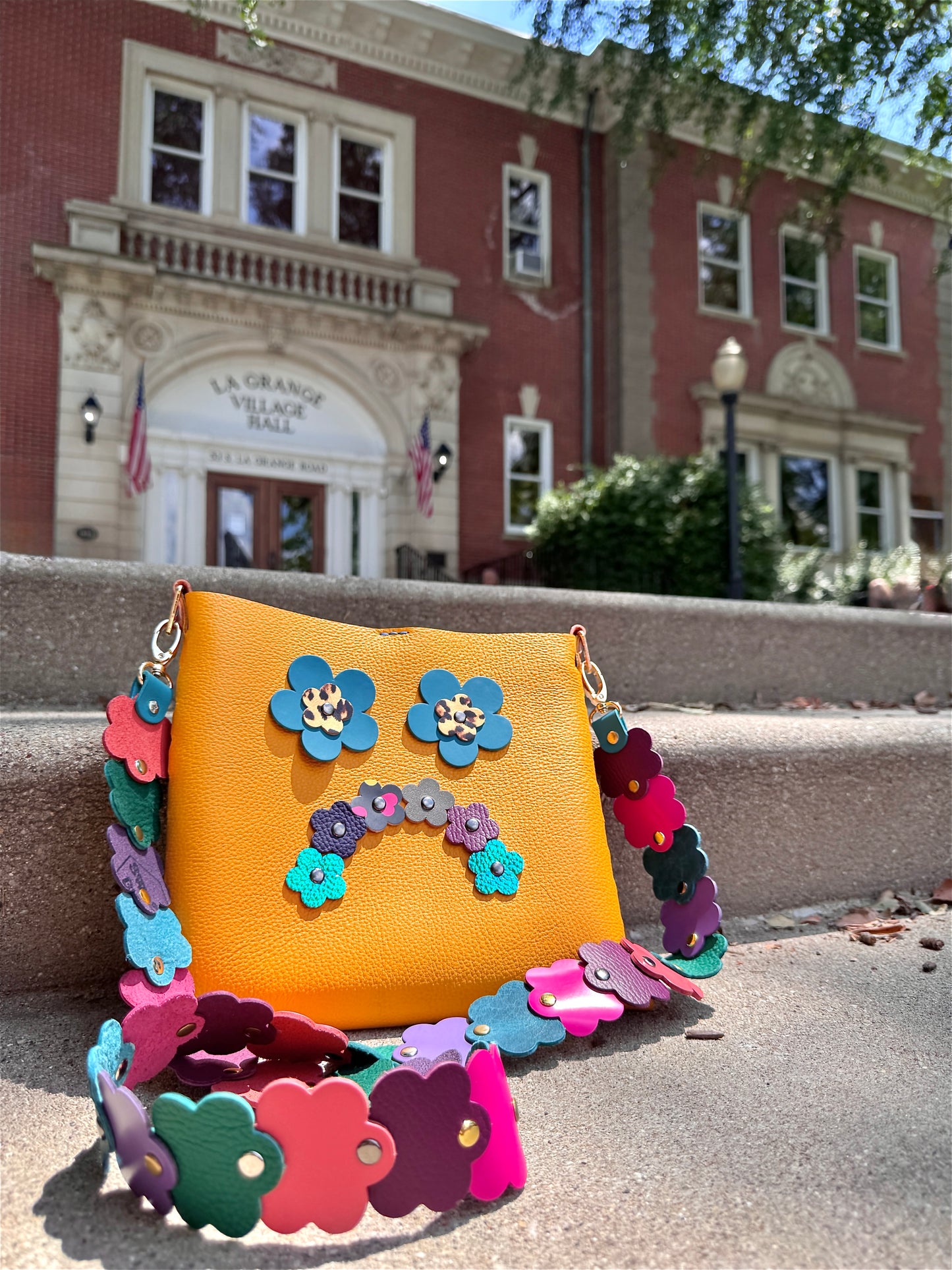Mood Swing Bag | Reversible Happy Face & Sad Face Handmade Leather Bag with Flower Strap