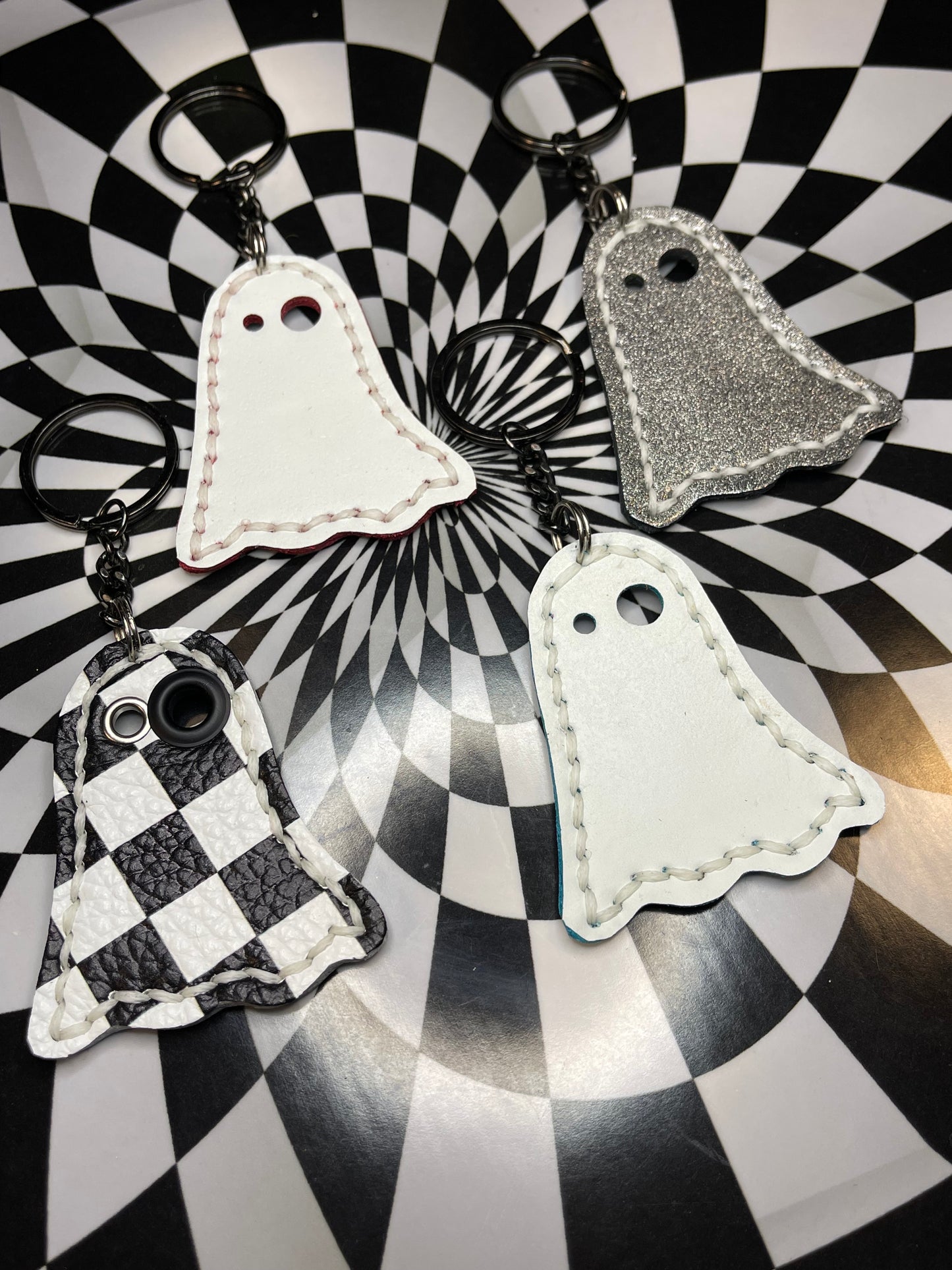 Ghost keychains! Glow in the dark spooky boys!