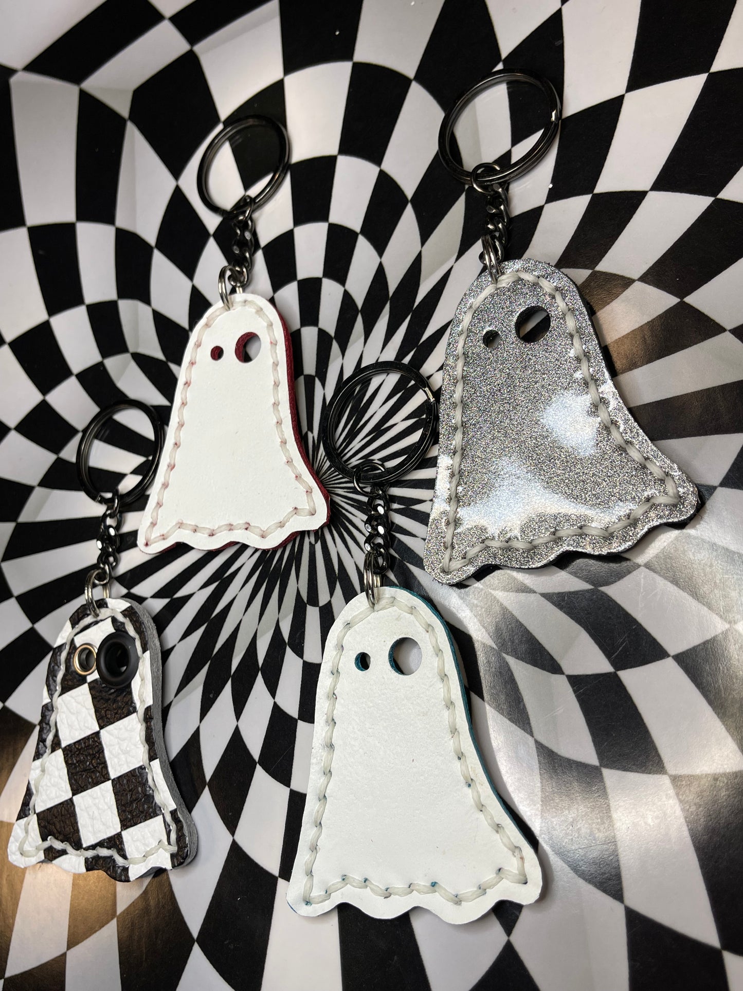 Ghost keychains! Glow in the dark spooky boys!