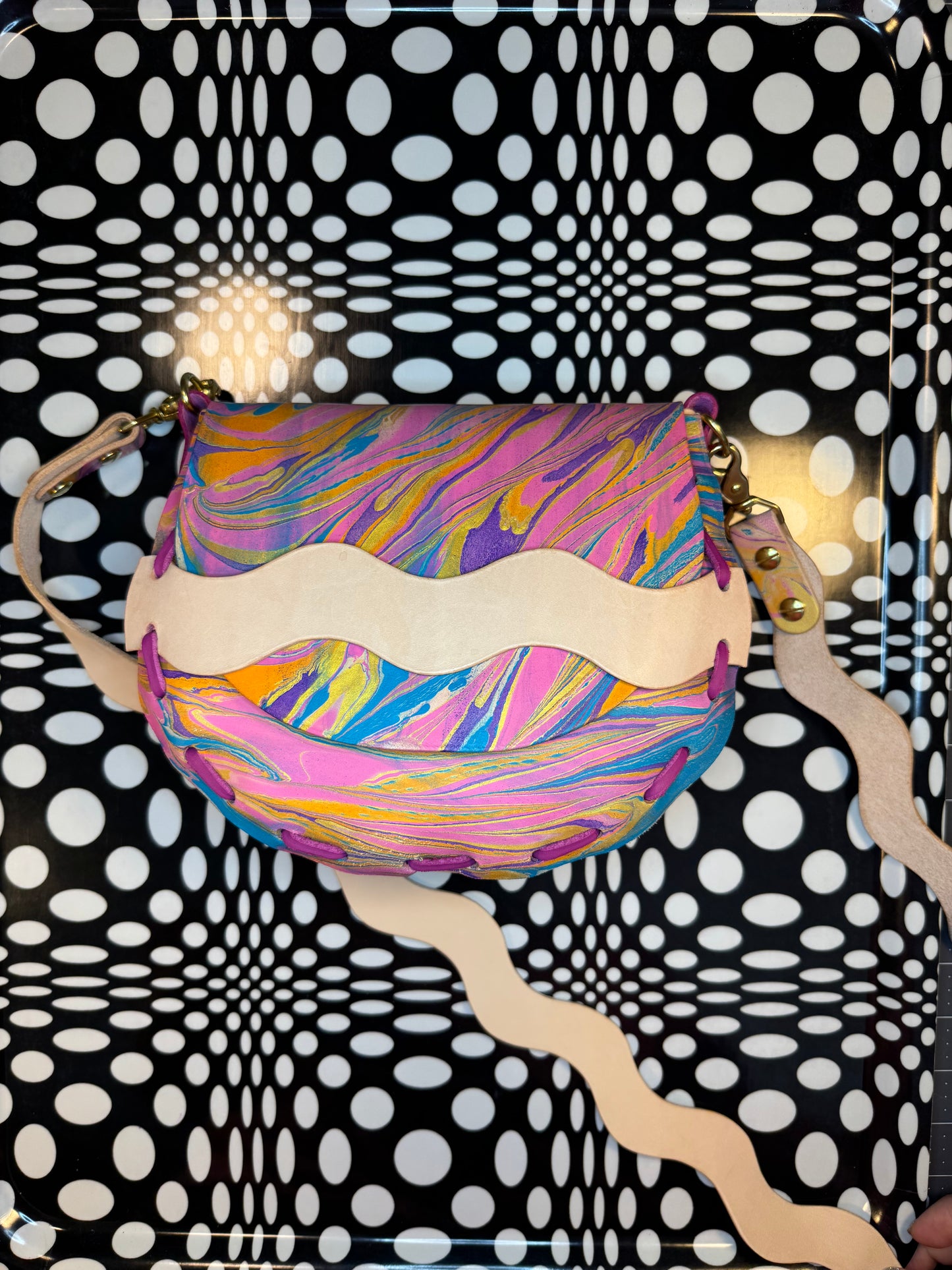 laced saddle bag marbled handmade