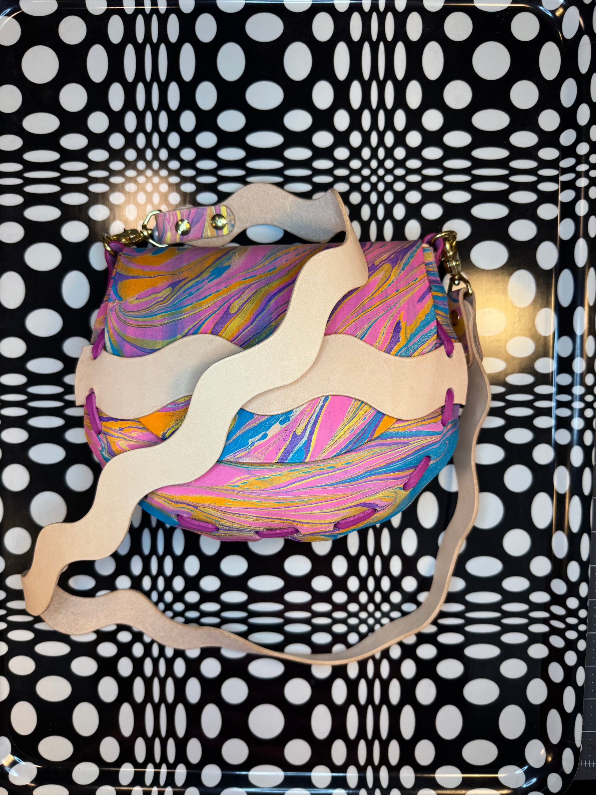 curved leather saddle bag handmade marbled