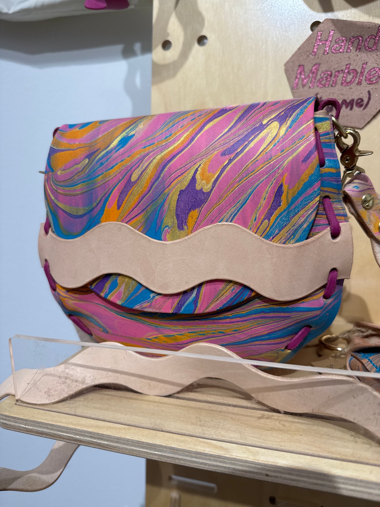 Laced leather saddle bag! One of a kind shoulder purse with wavy squiggly strap! Hand made, hand painted, shrunken bison or veg tan leather