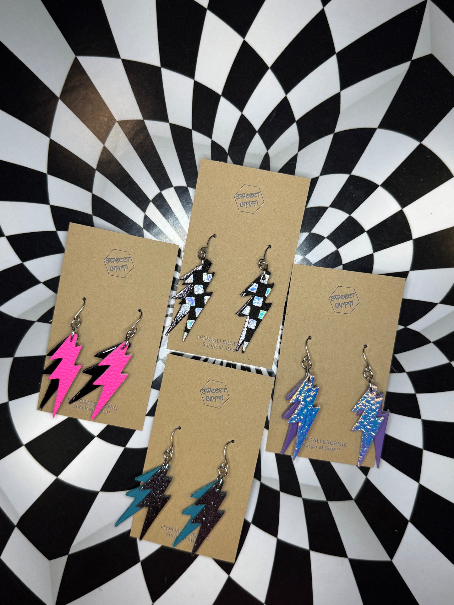 Lightning bolt leather earrings! Bowie!