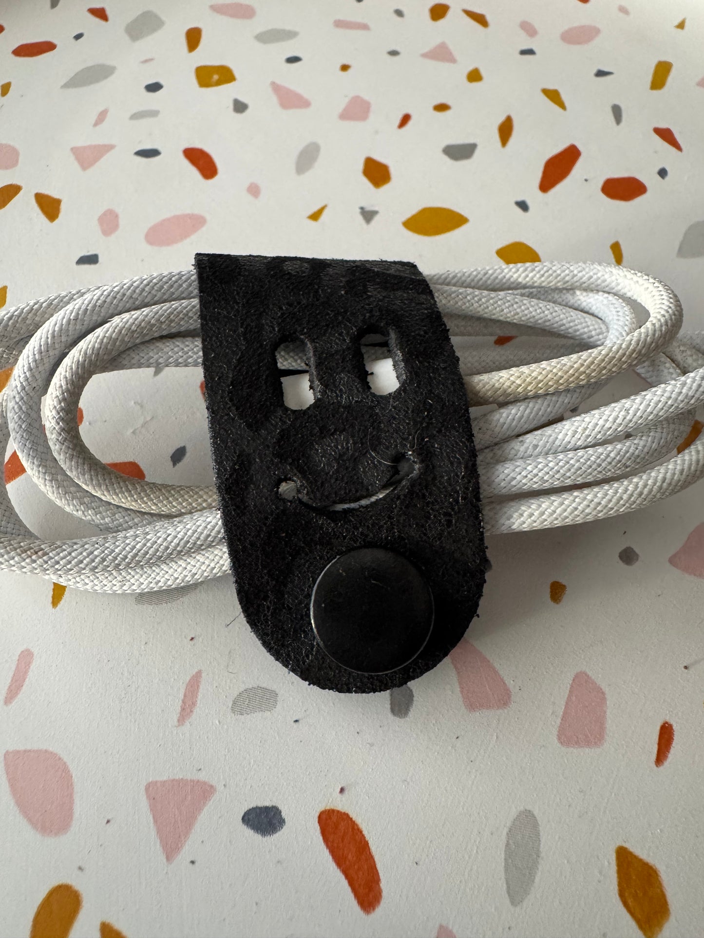 Cord creepers!! (Keepers) Happy smiley face leather strap charms!