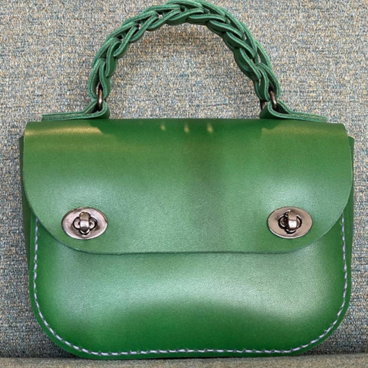 Michelle linked leather top handle mini bag!